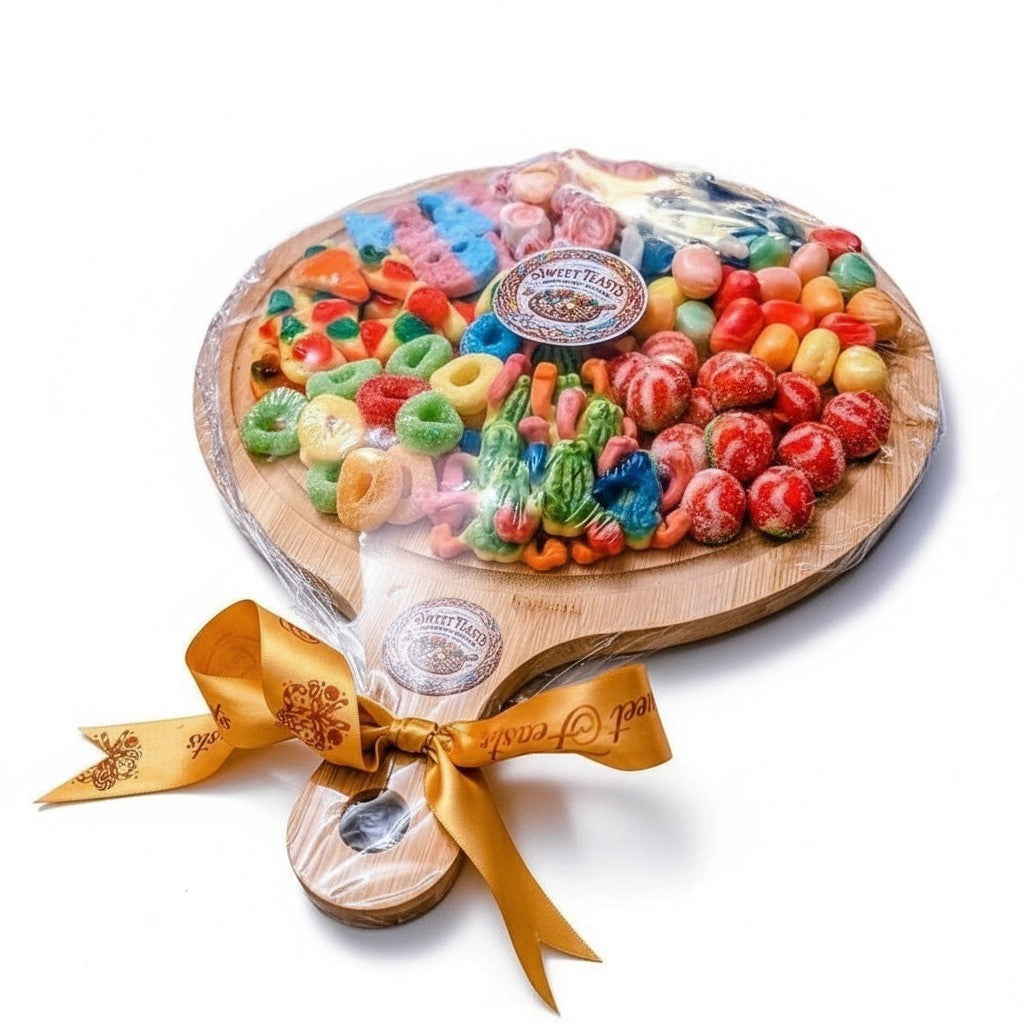 Sweet Feasts Candy Boards assorted confectionery platter featuring colourful gummies on a wooden serving board.