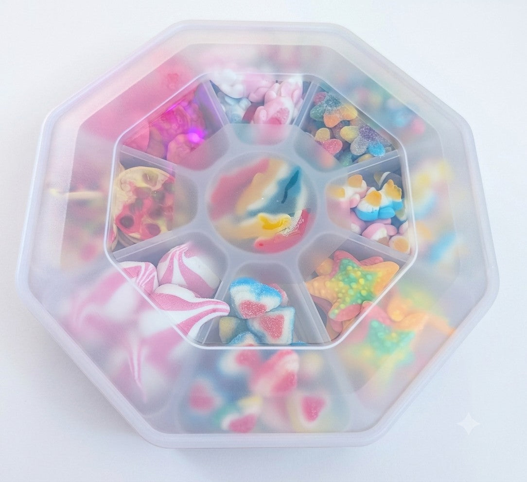 Sweet Feasts Candy Boards gummy sweet platter in a reusable octagonal tray with a clear lid for parties and gifts.