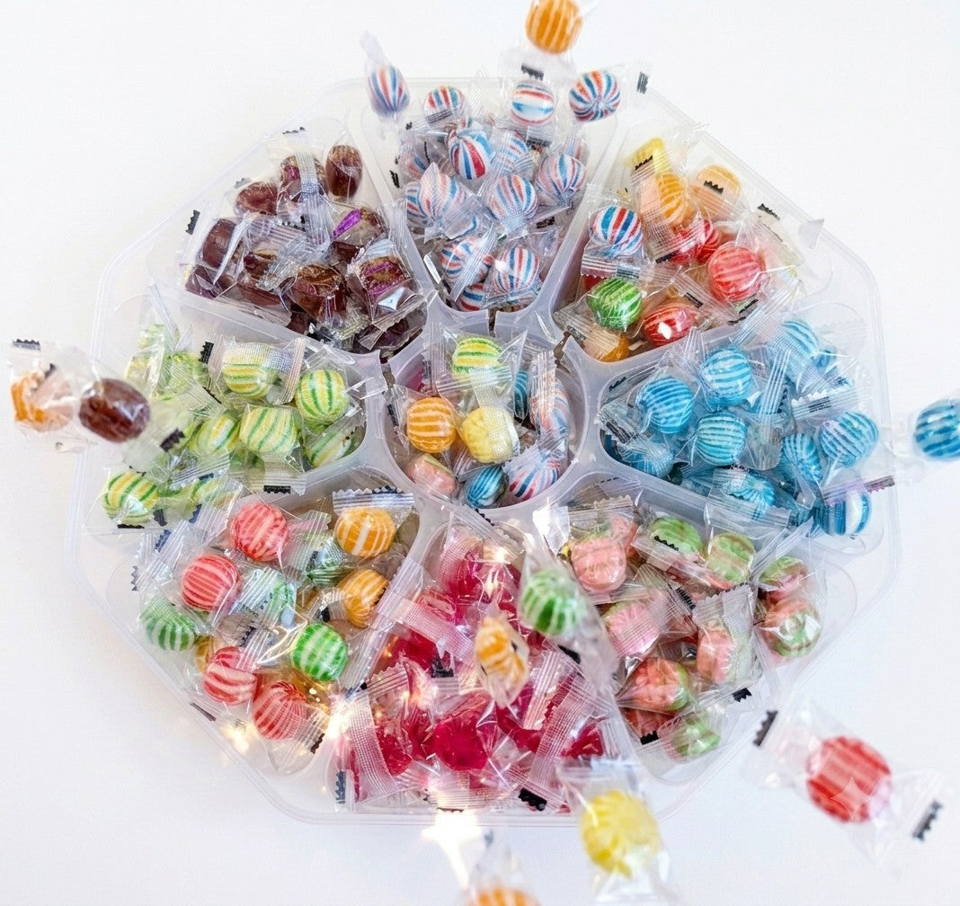 Sweet Feasts Candy Boards octagonal platter filled with an assortment of colourful individually wrapped hard candies