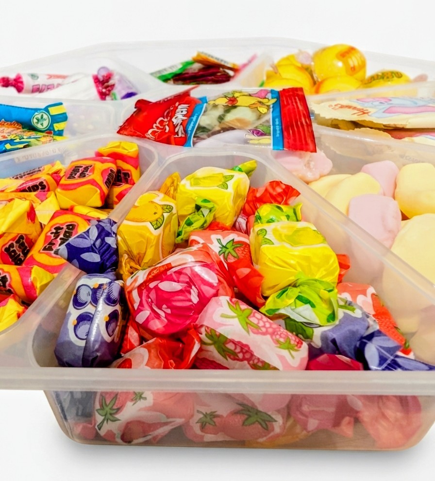 Sweet Feasts Candy Boards retro sweet platter filled with a vibrant assortment of colourful wrapped classic candies