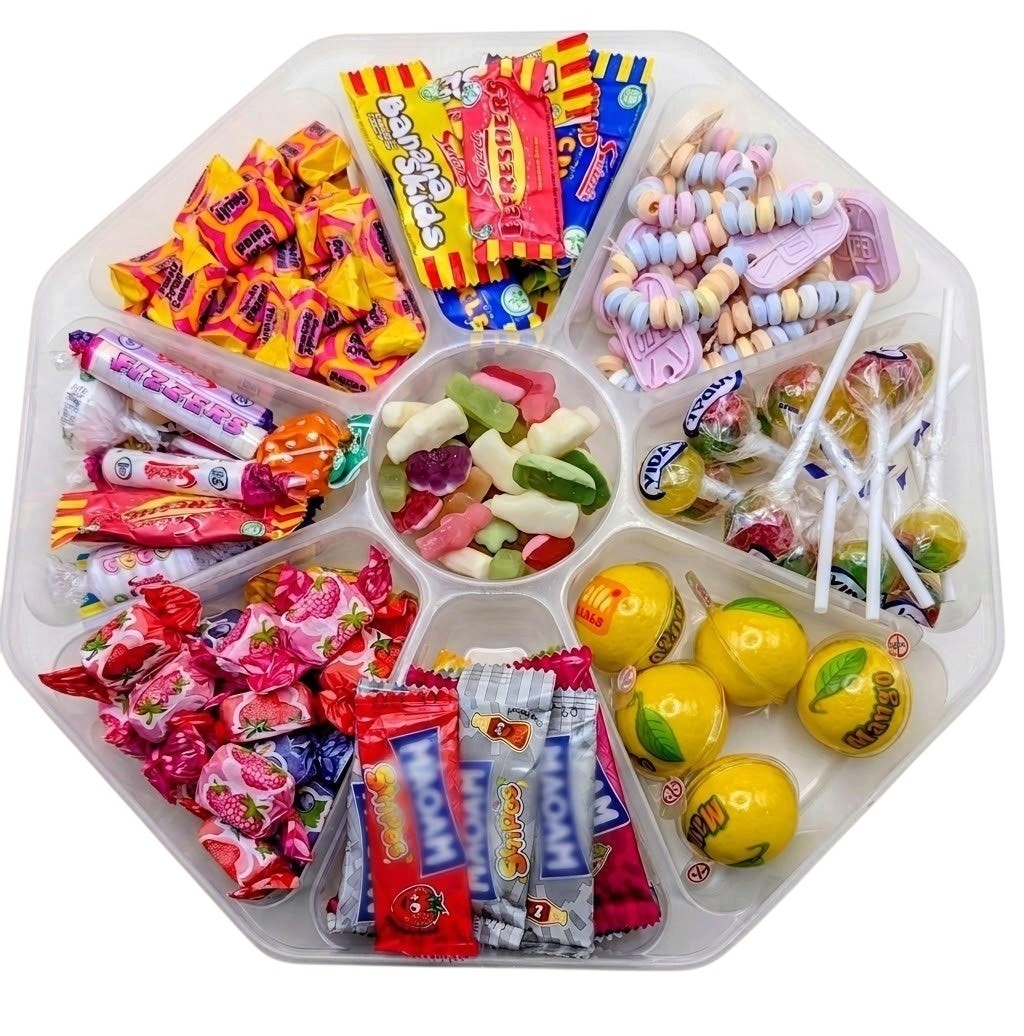 Sweet Feasts Candy Boards retro sweet platter featuring assorted colourful fruit chews, lollipops, and fizzy sweets.